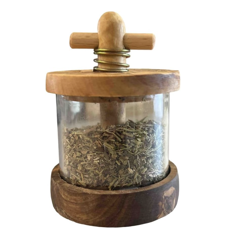 Manual French Olive wood herb mill for grinding herbs.
